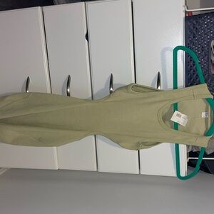 Light green body con dress w open back never worn, make up mark on back